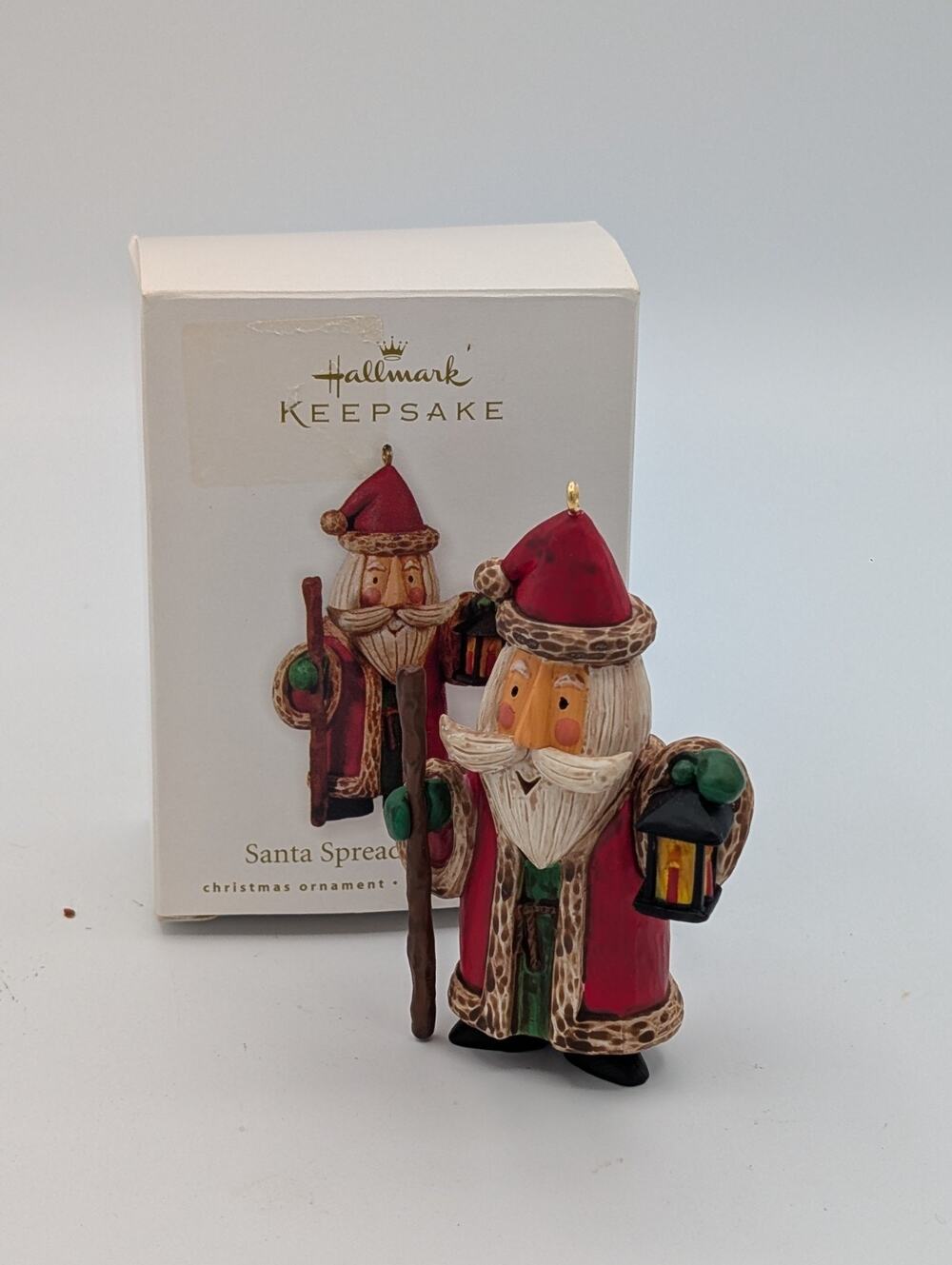 Santa Spreads the Spirit 2010 Hallmark Ornament MIB